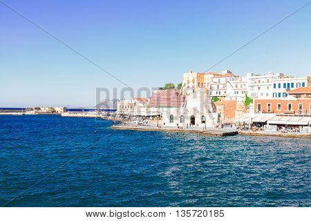 embankment and venetian bay with Turkish Mosque Yiali Tzami of Chania, Crete, Greece