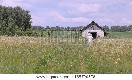 beekeeper goes to winterer for bees, summer