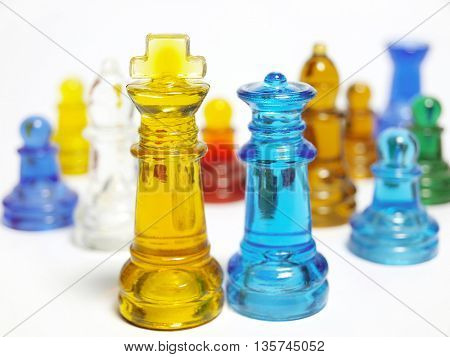 Colorful chess made of glass isolated on white background