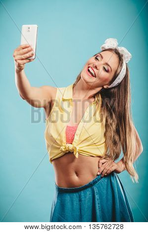 Retro Girl With Smartphone Taking Selfie