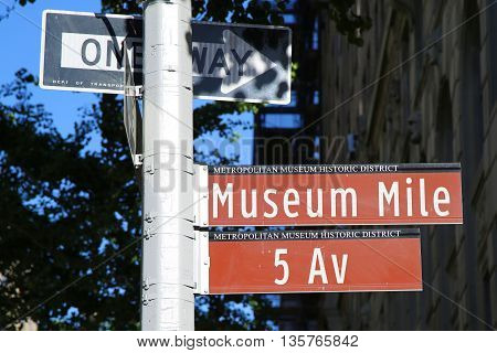 NEW YORK - JUNE 14, 2016: Street Signs along Museum Mile in Manhattan. Museum Mile is the name for a section of Fifth Avenue running from 82nd to 105th streets on the Upper East Side