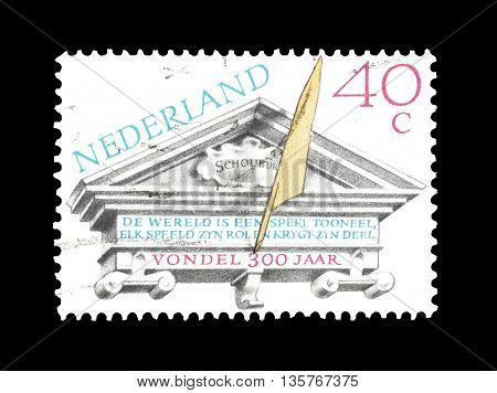 NETHERLANDS- CIRCA 1979 : Cancelled postage stamp printed by Netherlands, that shows Tympanum of the ancient theater of Amsterdam.
