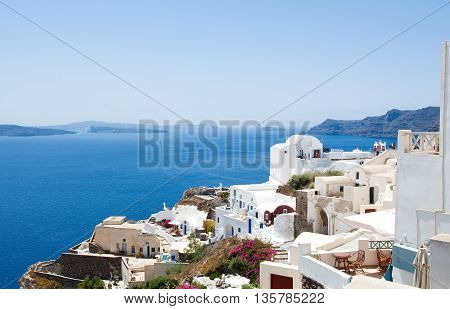 Oia With Typical White And Blue Painted Houses On The Island Of Santorini(thera) Greece.
