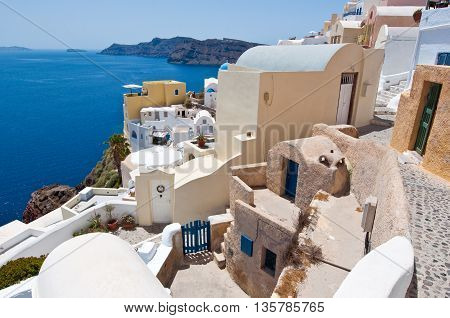 Oia village looking north towards the Therasia island on the island of Thera (Santorini) Greece.