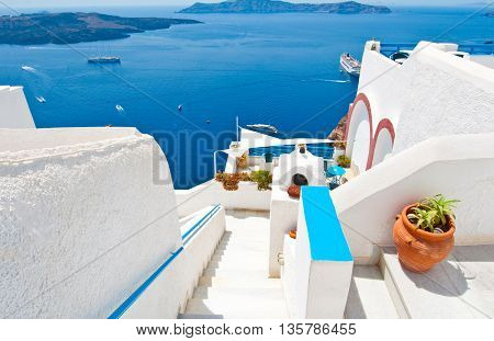 Steps down to the Idyllic patio in Fira on the island of Thera(Santorini) Greece.