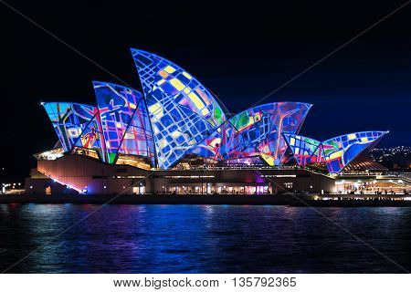 Sydney Australia - May 27 2016: Annual outdoor lighting festival Vivid Sydney: Festival of Light Music and Ideas. Sydney Opera House illumination Lighting the Sails Songlines. Long Exposure