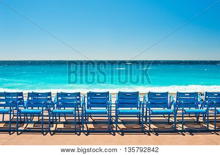 Blue Chairs On The Promenade Des Anglais In Nice, France