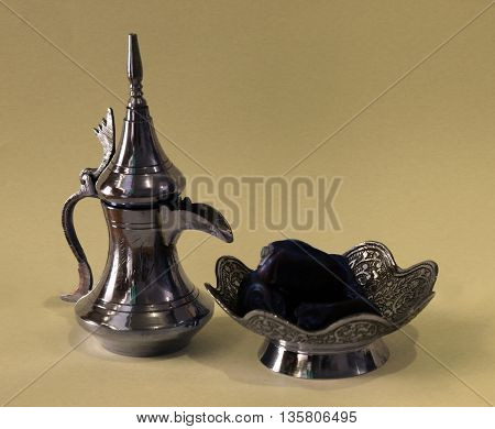 Arabic Coffee Pot with delicious dattes in bowl