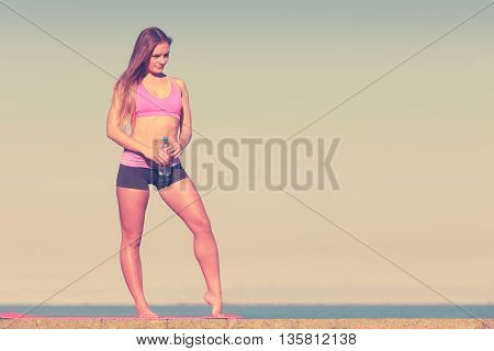 Woman Drinking Water After Sport Gym Outdoor