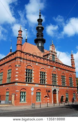 Gdansk Poland - May 28 2010: Renaissance red brick Ratusz town hall with ornamental steeple