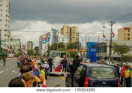 QUITO, ECUADOR - JULY 7, 2015: Pope Fracisco visiting Ecuador, popemobile on Quito streets, view from behind.