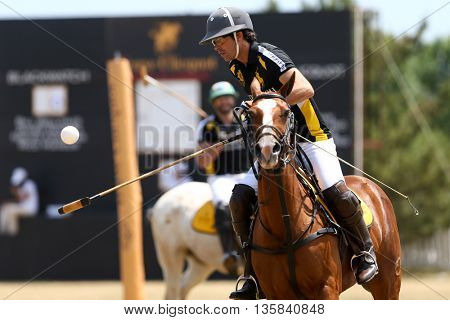 JERSEY CITY, NJ-MAY 30: Nacho Figueras handles the ball during a polo match at the 8th Annual Veuve Clicquot Polo Classic at Liberty State Park on May 30, 2015 in Jersey City, NJ.