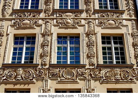 Torun Poland - May 25 2010: 18th century baroque facade of the House under the Gold Star in the Old Town Square