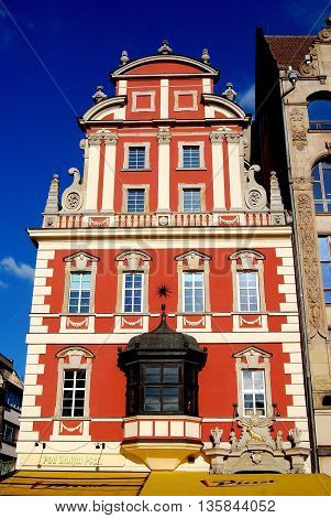 Wroclaw Poland - May 13 2010: Coral-coloured baroque burgher's house in the Rynek old market square