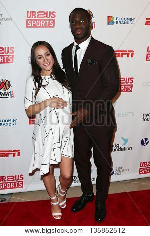 NEW YORK, NY-JUNE 3: New York Giants football player Prince Amukamara (R) and wife Pilar Davis attend the 2015 Up2Us Sports Gala at IAC Building on June 3, 2015 in New York City.