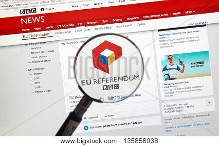 MONTREAL CANADA - JUNE 24 2016 : Brexit results on BBC news site under magnifying glass. The Brexit an abbreviation of 'British exit' refers to the possibility of Britain's withdrawal from the EU