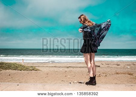 Pretty Girl Walking In Front Of The Beach In California