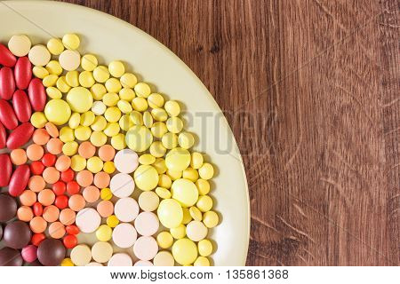 Colorful Medical Pills, Tablets And Capsules On Plate, Health Care Concept, Copy Space For Text