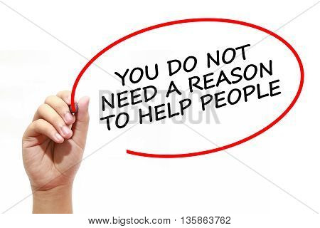 Man writing YOU DO NOT NEED A REASON TO HELP PEOPLE with marker on transparent wipe board.