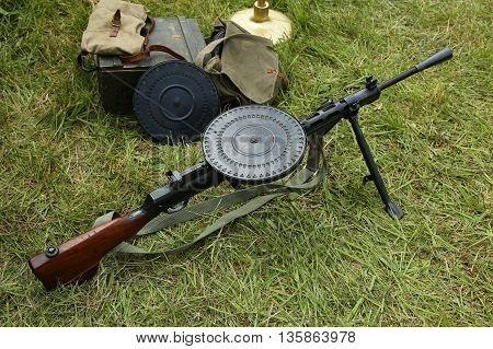 OLD BETHPAGE, NEW YORK - MAY 22, 2016: World War II Soviet Army military memorabilia with Degtyaryov machine gun on display during World War II encampment in Old Bethpage, NY