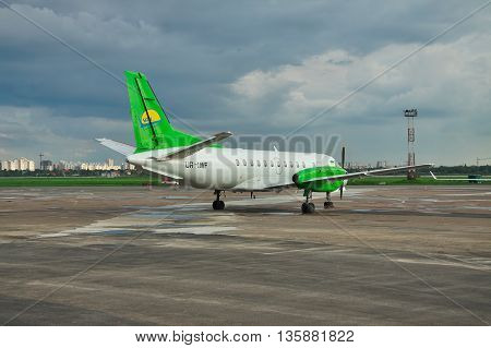 Kiev Ukraine - May 17 2012: South Airlines Saab 340B parked in front of the airport terminal