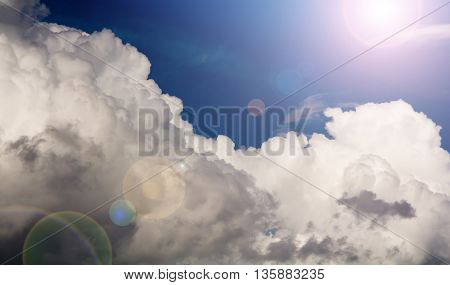 a huge cloud with the sun. sky