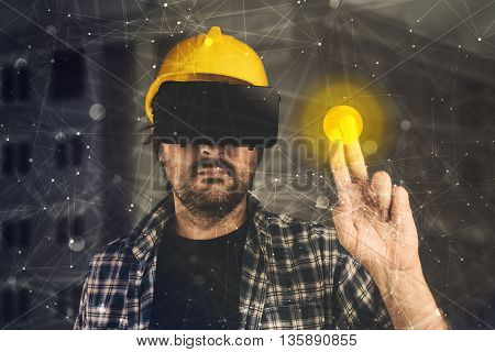 Construction engineer with VR goggles managing building project futuristic 3d cyberspace technology in architecture and construction industry