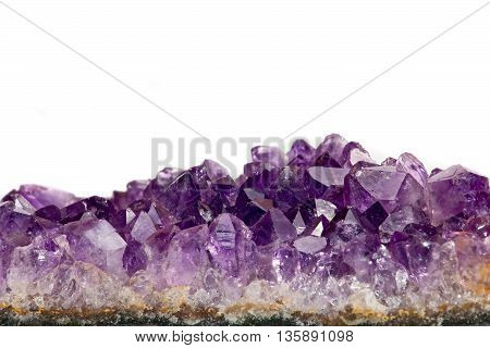 amethyst on a white background. photo Close-up