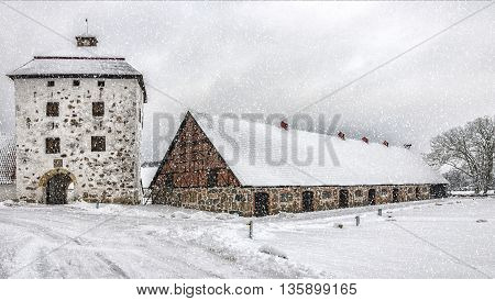 View of a snow covered Hovdala Castle in Hassleholm region. Hovdala Castle is a castle in Hassleholm Municipality Scania in southern Sweden.