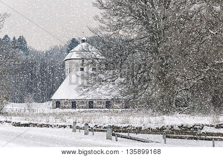 View of a snow covered Hovdala Castle in Hassleholm region. Hovdala Castle is a castle in Hassleholm Municipality Scania in southern Sweden.