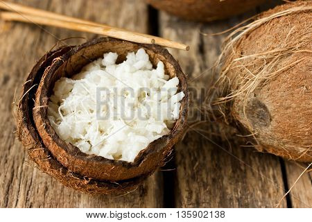 Chinese white boiled rice in coconut emptied selective focus