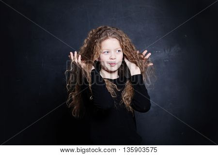 Redhead Child Girl. Cute Child with Long Red Hair