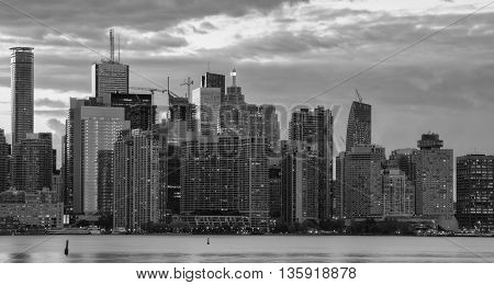 The Toronto skyline in black and white during sunset