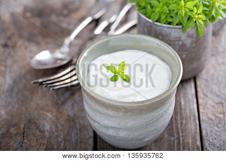 Horseradish and cream sauce in small cup