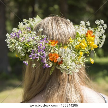 Swedish Midsummer Headgear Traditional on a female head of hair.