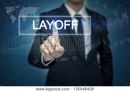 Businessman hand touching LAYOFF button on virtual screen