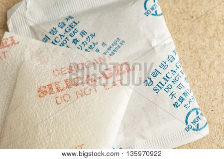Close Up Silica Gel Or Desiccant, Non-english Text Translate To 