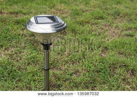 Solar Light in the grass. Clean energy is popular. For Earth, Superfund
