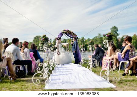 Beauty Bride And Handsome Groom Are Registering The Marriage. Wedding Couple Is Marrying. Beautiful