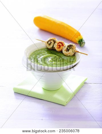 Green Fresh Vegetable Cream Soup With Skewers.