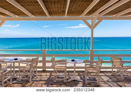 Restaurant Terrace Overlooking The Aegean Sea, Paleochori Beach, Milos. Cyclades Island, Greece.