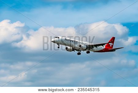 AIRPORT FRANKFURT,GERMANY: JUNE 23, 2017: Fokker 100 Helvetic Airways is a Swiss airline headquartered in Kloten with its fleet stationed at Zurich Airport