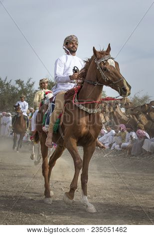 Ibri, Oman, April 7th, 2018: Omani Man On A Horse In A Countryside Of Oman