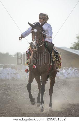 Ibri, Oman, April 7th, 2018: Omani Man On A Horse In A Countryside Of Oman