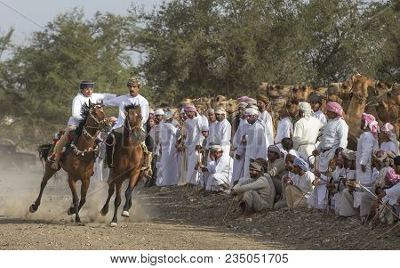 Omani Men On A Horse In  Rural Oman, Racing For Fun