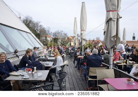 Graz, Austria - March 20, 2017: People At The Terrace Of The Kastner And Ohler Warehouses With Views