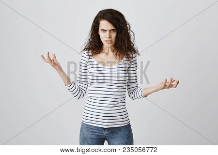 Do Not Come Closer Unless You Want To Burn In Her Rage. Portrait Of Angry Cute European Woman With C