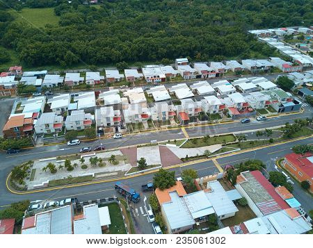 Street With Park In Residential Area Above View. Broadwalk Between Houses In Residential Area