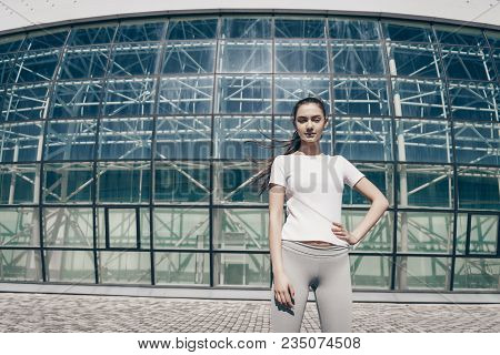 Sports Zealous Girl Goes In For Sports Outdoors, Stretching And Training, A Healthy Lifestyle