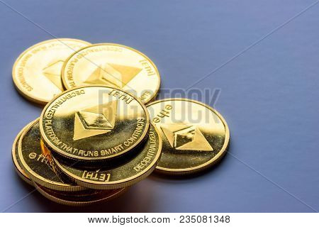 Golden Bitcoin Coins On A Dark Background With Euro Coins. Virtual Currency. Crypto Currency. New Vi